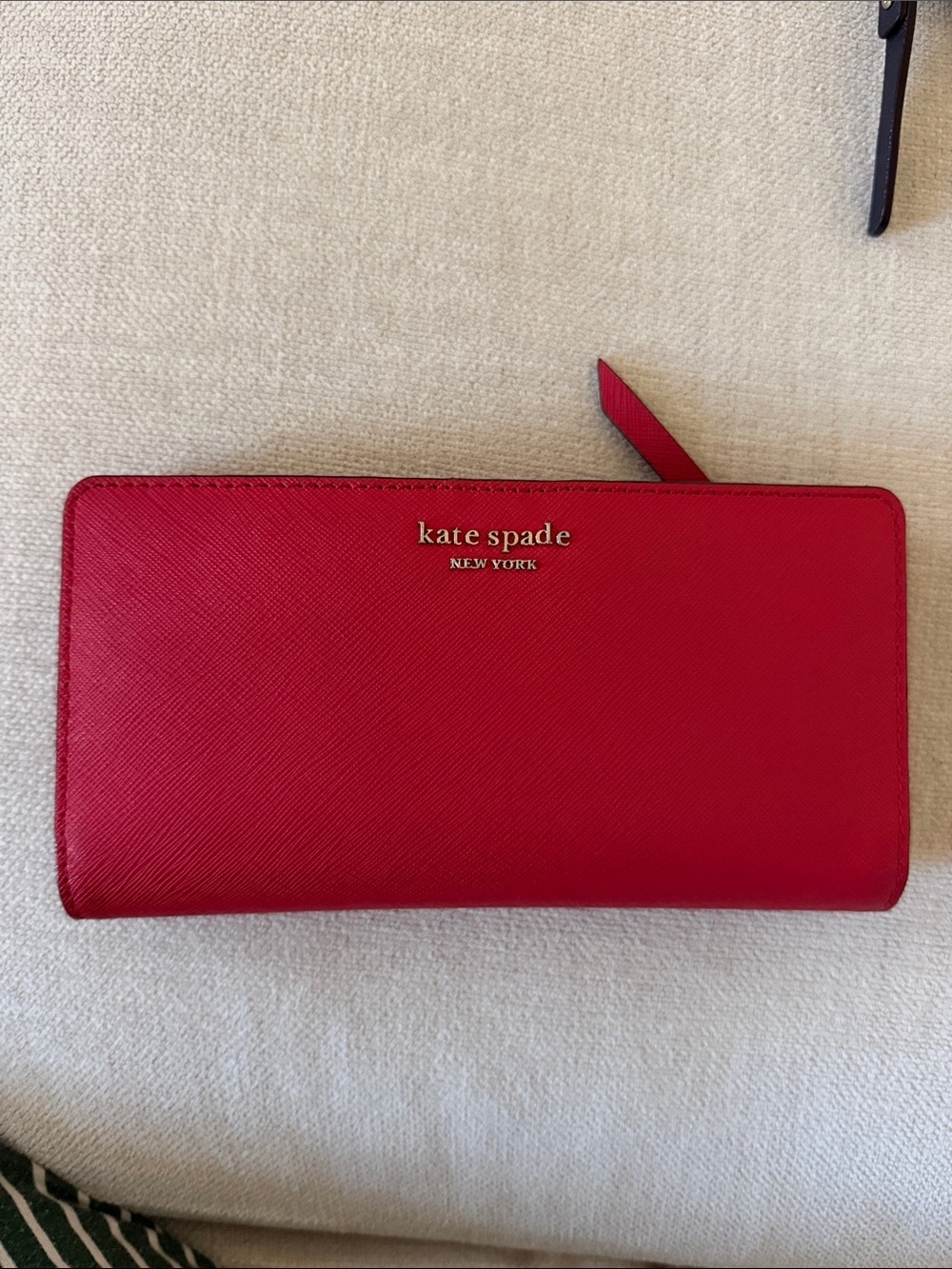 kate spade red Saffiano zip-around continental wallet